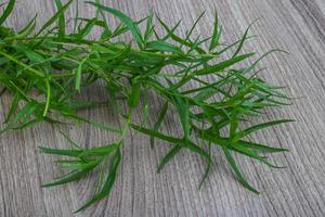 Tarragon on wood photo