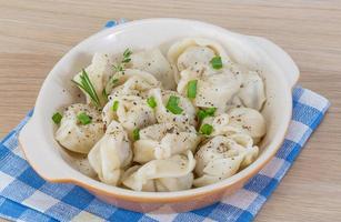 Russian dumplings on wood photo