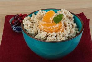 Oatmeal on wood photo