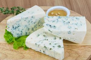 Blue cheese on wood photo