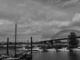 The city of Nijmegen at the river waal in the netherlands photo