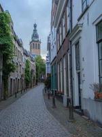 The city of Nijmegen at the river waal in the netherlands photo