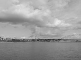 The city of Nijmegen at the river waal in the netherlands photo