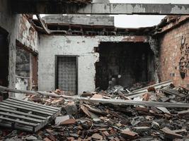 Interior of ruined, abandoned building. The ruins of an abandoned ruined house. photo