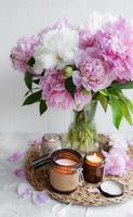 Bouquet of beautiful peonies in vase photo