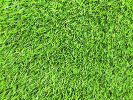 Modern green lawn texture background. Wallpaper for work and design. photo