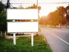 Two blank frame billboard mockup on the highway road background. space for text or design photo