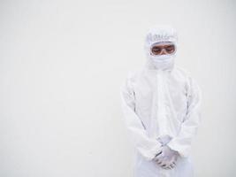 Asian male doctor or scientist in PPE suite uniform with wearing face mask protective. The mood is like sad and calm, coronavirus or COVID-19 concept isolated white background photo