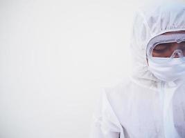 Closeup of asian male doctor or scientist in PPE suite uniform. coronavirus or COVID-19 concept isolated white background photo