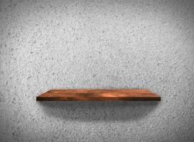 Top view of wood shelves on concrete wall texture background with clipping path for design photo