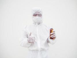 Portrait of doctor or scientist in PPE suite uniform holding plastic bottle with skin care product. COVID-19 concept isolated white background photo