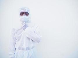 Portrait of confident asian male doctor or scientist in PPE suite uniform empty space deep thinking creative person hand on chin with looking ahead on white background. COVID-19 concept. photo