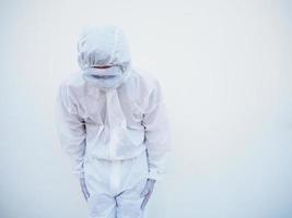 Asian male doctor or scientist in PPE suite uniform with wearing face mask protective. The mood is like sad and calm, coronavirus or COVID-19 concept isolated white background photo