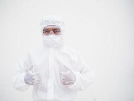 Asian male doctor or scientist in PPE suite uniform showing thumbs up. coronavirus or COVID-19 concept isolated white background photo