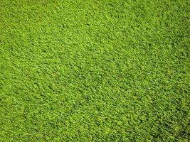 Artificial grass texture space background photo