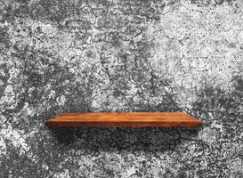 Wood shelves on concrete wall texture background with clipping path. Top view photo