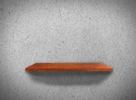 Top view of wood shelves on concrete wall texture background with clipping path for design photo