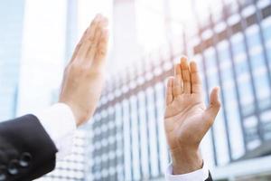 Audience applauding at a business appreciation. People congratulation and clapping hands at conference and presentation. photo