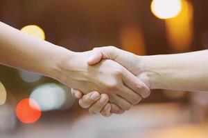 Couples hold hands together at night, romantic atmosphere. photo