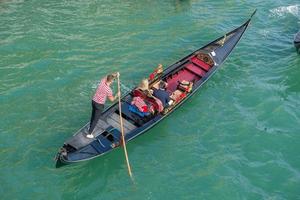 Venice Italy September 2022Gondola that transports tourists on vacation in Venice photo