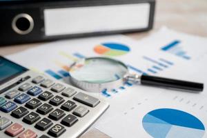 Binder data finance report business with graph analysis in office. photo
