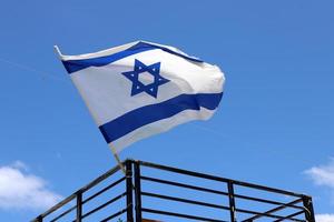 The blue and white flag of Israel with the six-pointed Star of David. photo