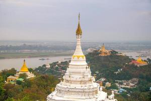 Sagaing hill with numerous pagodas and Buddhist monasteries on the Irrawaddy river, Sagaing, Myanmar photo