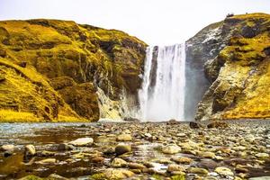 Skogafoss, a waterfall situated on the Skoga River in the south of Iceland at the cliffs of the former coastline photo
