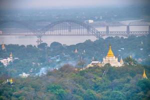 Sagaing hill with numerous pagodas and Buddhist monasteries on the Irrawaddy river, Sagaing, Myanmar photo