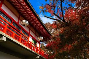 Autumn scene of Kurama-dera, a temple situated at the base of Mount Kurama in the far north of Kyoto Prefecture, Kansai, Japan photo