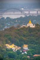 Sagaing hill with numerous pagodas and Buddhist monasteries on the Irrawaddy river, Sagaing, Myanmar photo