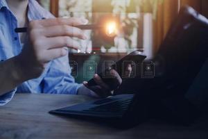 man using mouse and keyboard for streaming online, watching video on internet, live concert, show or tutorial photo