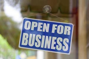 Blue open for business sign photo