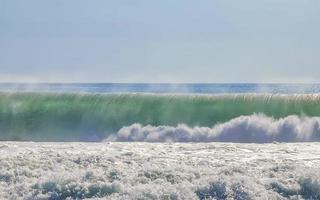 Extremely huge big surfer waves at beach Puerto Escondido Mexico. photo