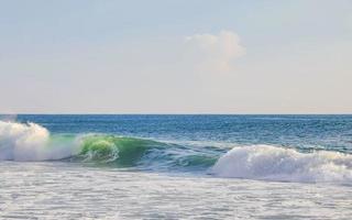 Extremely huge big surfer waves at beach Puerto Escondido Mexico. photo