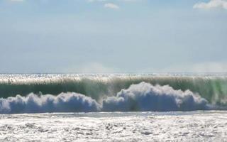 Extremely huge big surfer waves at beach Puerto Escondido Mexico. photo