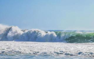 Extremely huge big surfer waves at beach Puerto Escondido Mexico. photo