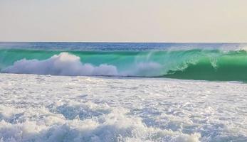 Extremely huge big surfer waves at beach Puerto Escondido Mexico. photo