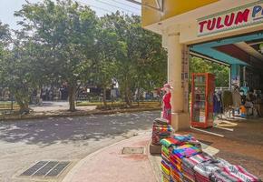 Tulum Quintana Roo Mexico 2022 Typical colorful street road bars restaurants palms shops Tulum Mexico. photo