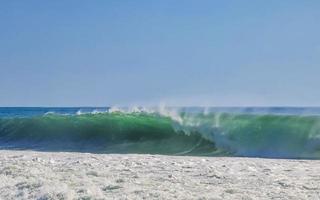 Extremely huge big surfer waves at beach Puerto Escondido Mexico. photo