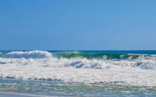 Extremely huge big surfer waves at beach Puerto Escondido Mexico. photo