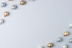 Christmas grey minimal background with grey and beige ball and confetti. Flat lay, copy space photo