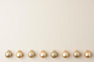 Christmas pastel beige minimal background with beige ball. Flat lay, copy space photo