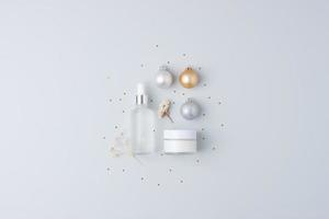 Christmas cosmetic product display. Skin care products on grey background. Flat lay, copy space photo