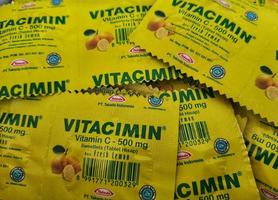 Jakarta, Indonesia in July 2022. A bunch of Vitamin C with the brand Vitacimin. photo