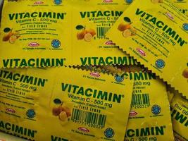 Jakarta, Indonesia in July 2022. A bunch of Vitamin C with the brand Vitacimin. photo