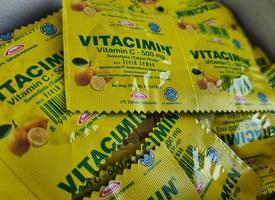 Jakarta, Indonesia in July 2022. A bunch of Vitamin C with the brand Vitacimin. photo