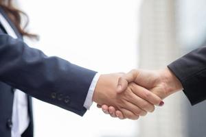 Business shake hands Buy a new business For the company's growth photo