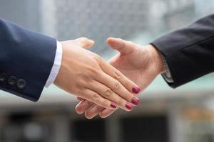 Business shake hands Buy a new business For the company's growth
