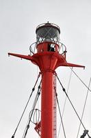 Mast and signal lamp of floating beacon, close up photo